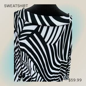 Travelers by Chicos 2  (12-14) M  Black and white long sleeve top with V-neck